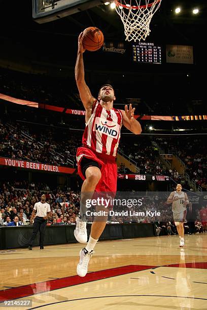 Linas Kleiza of Olympiacos lays the ball up during the preseason game against the Cleveland Cavaliers on October 12, 2009 at Quicken Loans Arena in...