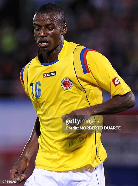 Colombia's Adrian Ramos celebrates after scoring against Paraguay during their FIFA World Cup South Africa 2010 football qualifier at Defensores del...