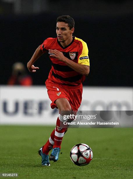 Jesus Navas of Sevilla runs with the ball during the UEFA Champions League Group G match between VfB Stuttgart and Sevilla FC at the Mercedes-Benz...