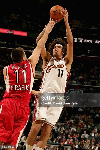Anderson Varejao of the Cleveland Cavaliers shoots over Linas Kleiza of Olympiacos during the preseason game on October 12, 2009 at Quicken Loans...