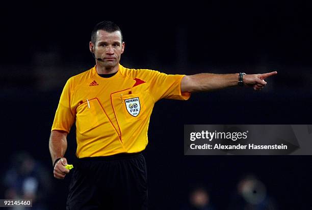 Referee Pieter Vink reacts during the UEFA Champions League Group G match between VfB Stuttgart and Sevilla FC at the Mercedes-Benz Arena on October...