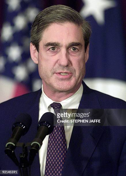 Director Robert S. Mueller III speaks at the FBI Washington Headquarters 10 October 2001 where US President George W. Bush unveiled a new the "Most...
