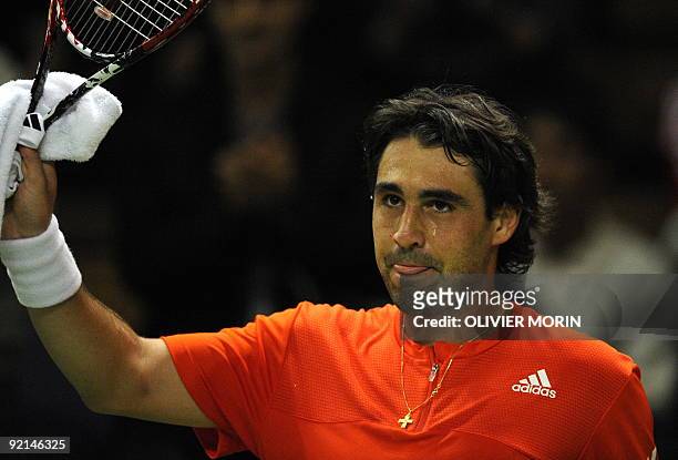 Marcos Baghdatis of Cyprus waves to the crowd after his match against Spain's Juan Carlos Ferrero in Stockholm on October 21 during the third day of...