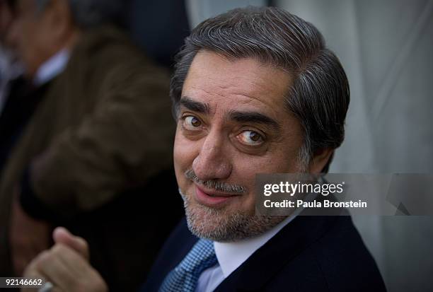 Afghanistan presidential election candidate Abdullah Abdullah reacts while speaking to the media during a news conference at his home October 21,...