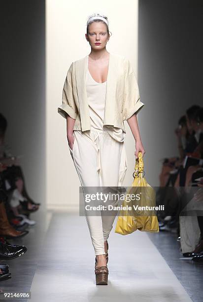 Model walks down the runway during the Bottega Veneta show as part of Milan Womenswear Fashion Week Spring/Summer 2010 at on September 26, 2009 in...