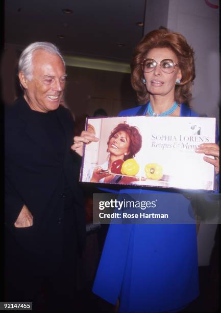 Designer Giorgio Armani and actress Sophia Loren at Loren's book party held at the Armani boutique in New York, 1999.