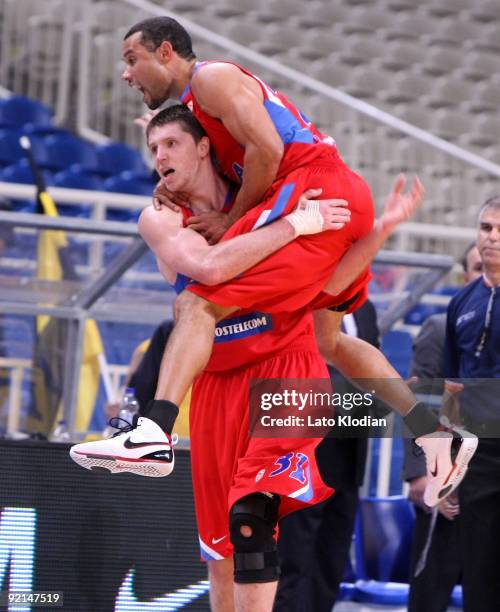 Viktor Khryapa, #31 and Trajan Langdon, #21 of CSKA Moscow celebrates during the Euroelague Basketball Game Day 1 match between Maroussi BC vs CSKA...