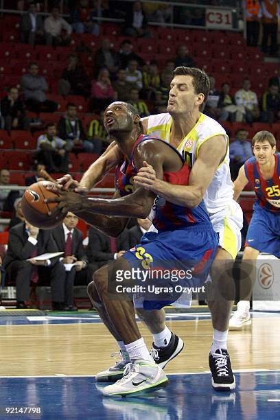 Terence Morris, #23 of Regal FC Barcelona competes with and Gordan Giricek, #10 of Fenerbahce Ulker during the Euroleague Basketball Regular Season...