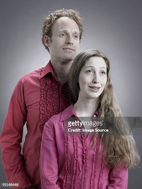 portrait of a kitsch couple - gerafft stock-fotos und bilder