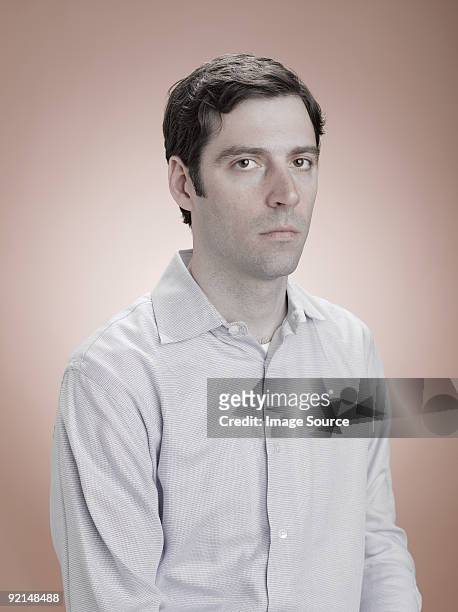 portrait of a serious looking man - blank expression imagens e fotografias de stock