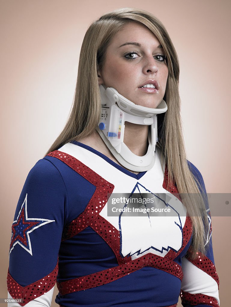 Cheerleader wearing a neck brace