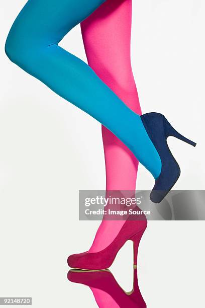 woman with contrasting tights and shoes - nylons high heels stock pictures, royalty-free photos & images