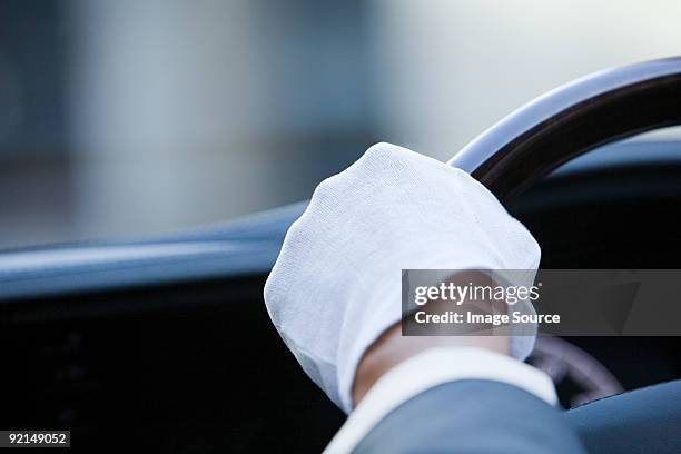 a chauffeurs glove - white glove fotografías e imágenes de stock