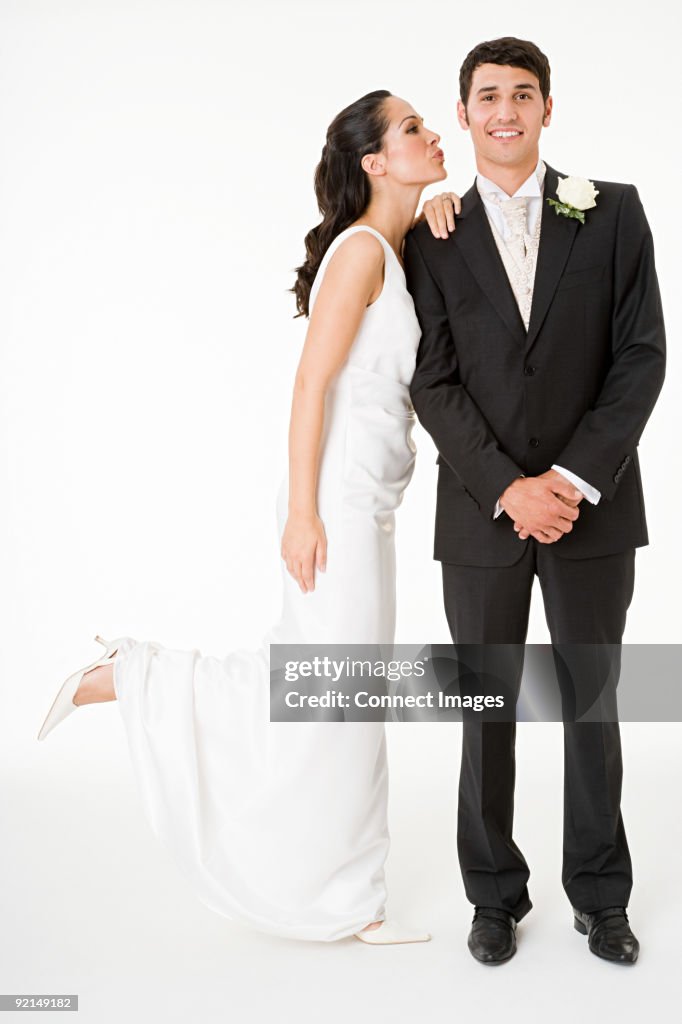 Bride kissing the groom