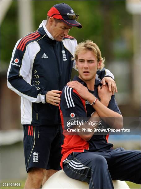 England's Stuart Broad receives treatment from team physiotherapist Kirk Russell before the 2nd NatWest Series One Day International between England...