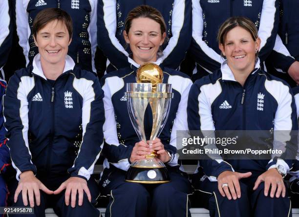 England's Claire Taylor , captain Charlotte Edwards and Nicky Shaw with the ICC Women's World Cup trophy at Lord's Cricket Ground, London, 24th March...