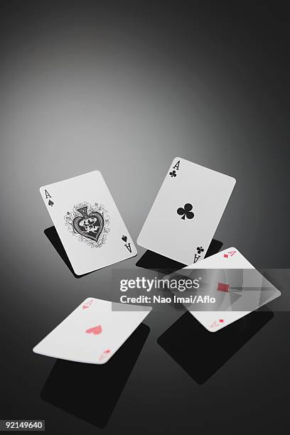 four aces playing cards in studio - ace of clubs stock pictures, royalty-free photos & images