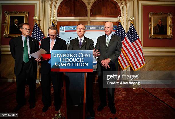 Senate Majority Leader Sen. Harry Reid speaks as Jim Guest, president and CEO of the Consumers Union, Sen. Charles Schumer , and Sen. Patrick Leahy...