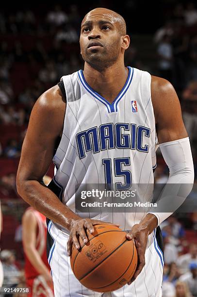 Vince Carter of the Orlando Magic shoots a free throw during the preseason game against the Houston Rockets on October 9, 2009 at Amway Arena in...