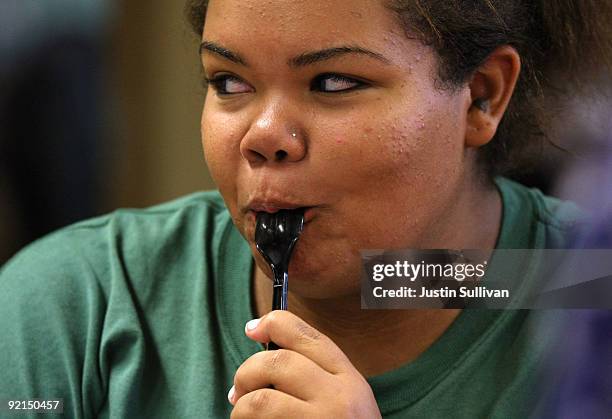 Seventeen year-old Marissa Hamilton licks her spoon as she eats a meal at Wellspring Academy October 21, 2009 in Reedley, California. Struggling with...