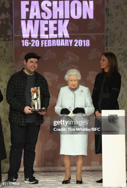 Queen Elizabeth II awards designer Richard Quinn the inaugural Queen Elizabeth II award for British Design alongside Chief Executive of the British...