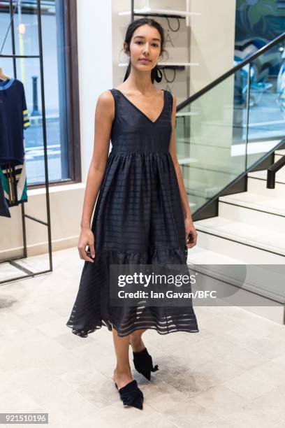 Model poses at the A by Jigsaw Presentation during London Fashion Week February 2018 at St James Emporium on February 20, 2018 in London, England.