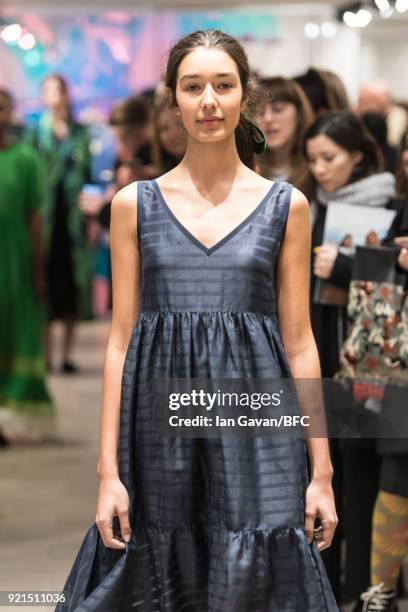 Model poses at the A by Jigsaw Presentation during London Fashion Week February 2018 at St James Emporium on February 20, 2018 in London, England.