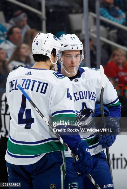 Nikolay Goldobin and Michael Del Zotto of the Vancouver Canucks talk during the game against the San Jose Sharks at SAP Center on February 15, 2018...