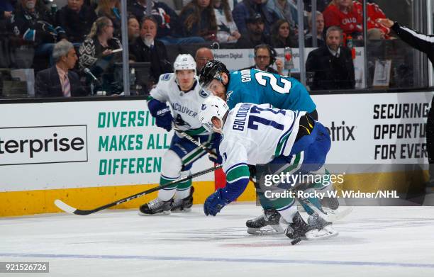 Nikolay Goldobin of the Vancouver Canucks skates against Barclay Goodrow of the San Jose Sharks at SAP Center on February 15, 2018 in San Jose,...