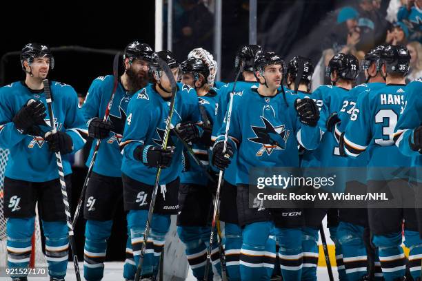 The San Jose Sharks celebrate after defeating the Vancouver Canucks at SAP Center on February 15, 2018 in San Jose, California.