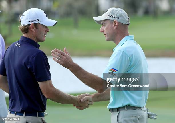 Jim Furyk shakes hands with Brandt Snedeker following a practice round prior to The Honda Classic at PGA National Resort and Spa on February 20, 2018...