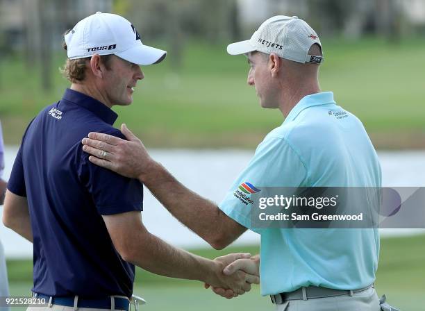 Jim Furyk shakes hands with Brandt Snedeker following a practice round prior to The Honda Classic at PGA National Resort and Spa on February 20, 2018...