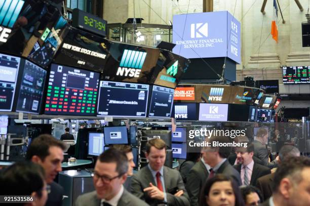 Traders work on the floor of the New York Stock Exchange in New York, U.S., on Tuesday, Feb. 20, 2018. Treasuries fell, with investors driving the...