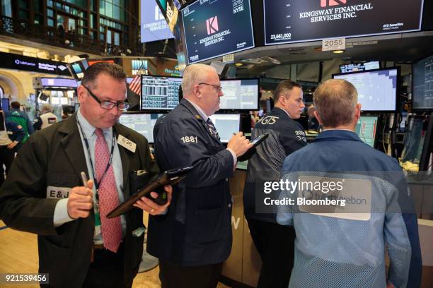 Traders work on the floor of the New York Stock Exchange in New York, U.S., on Tuesday, Feb. 20, 2018. Treasuries fell, with investors driving the...