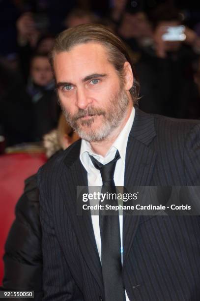 Joaquin Phoenix attends the 'Don't Worry, He Won't Get Far on Foot' premiere during the 68th Berlinale International Film Festival Berlin at...