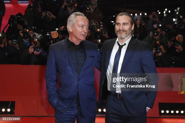 Udo Kier and Joaquin Phoenix attend the 'Don't Worry, He Won't Get Far on Foot' premiere during the 68th Berlinale International Film Festival Berlin...