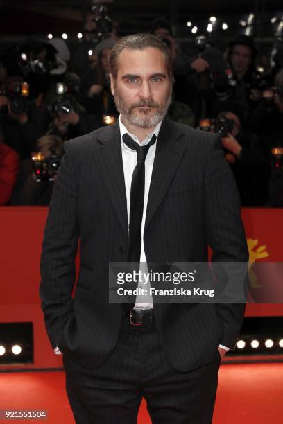 Joaquin Phoenix attends the 'Don't Worry, He Won't Get Far on Foot' premiere during the 68th Berlinale International Film Festival Berlin at...