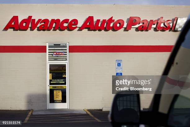 Vehicle sits parked outside an Advance Auto Parts Inc. Store in Phoenix, Arizona, U.S., on Monday, Feb. 19, 2018. Advance Auto Parts is scheduled to...