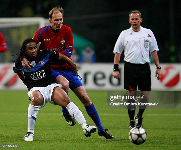 Elvir Rahimic of PFC CSKA Moscow fights for the ball with Anderson of Manchester United FC during the UEFA Champions League group B match between...