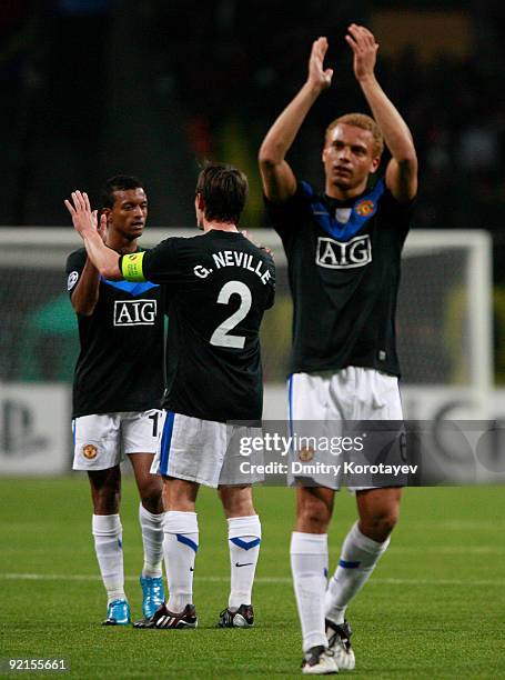 Nani, Gary Neville and Wes Brown of Manchester United FC celebrate after their victory over CSKA Moscow after the UEFA Champions League group B match...