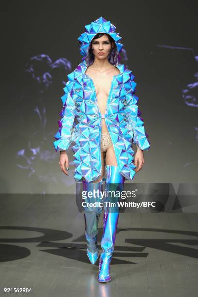 Model walks the runway at the On|Off Presents - Jack Irving show during London Fashion Week February 2018 at BFC Show Space on February 20, 2018 in...