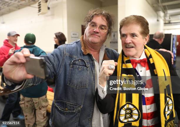 Rene Rancourt, right, poses for a selfie with Ed Favreau from Weymouth before he sings both the U.S. And Canadian National Anthems before the 2nd...