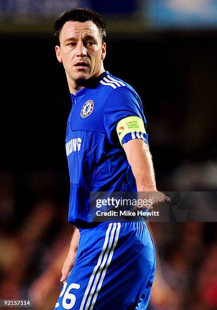 Detailed view of the Chelsea badge and 'Unite Against Racism' captain's armband worn by John Terry during the UEFA Champions League Group D match...