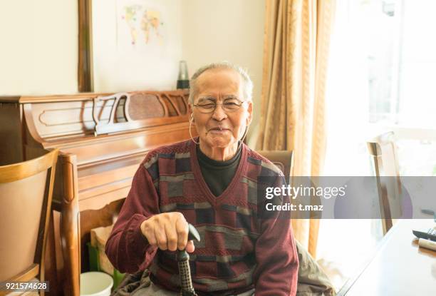 an old man winking with a smile. - thank you smile stock-fotos und bilder