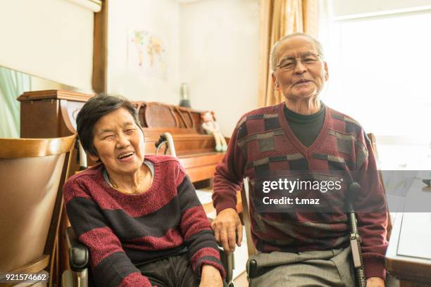 a smiling old couple. - t maz stock pictures, royalty-free photos & images