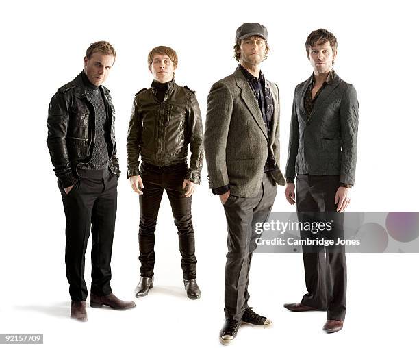 Members of the band Take That pose at a portrait session in 2009. Gary Barlow, Howard Donald, Mark Owen, Jason Orange.