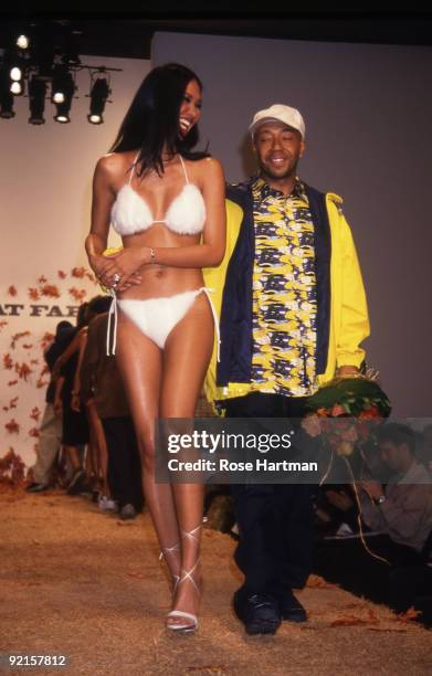 Kimora Lee Simmons and Rusell Simmons at her show in Bryant Park, New York, ca.1999.