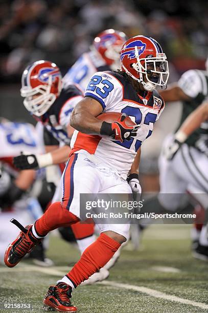 Marshawn Lynch of the Buffalo Bills rushes against the New York Jets at Giants Stadium on October 18, 2009 in East Rutherford, New Jersey. The Bills...