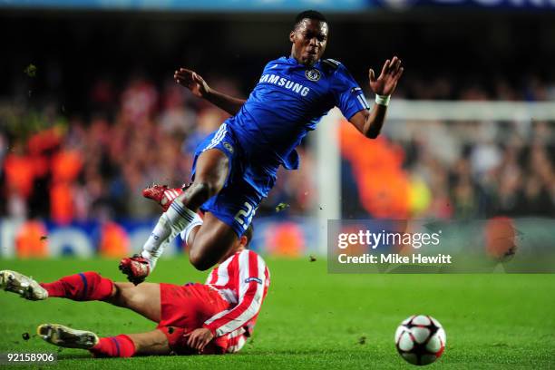 Daniel Sturridge of Chelsea is tackled by Alvaro Dominguez Soto of Atletico Madrid during the UEFA Champions League Group D match between Chelsea and...