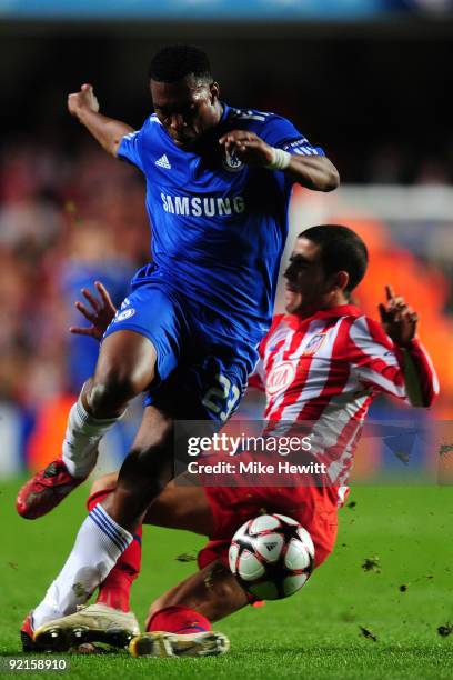 Daniel Sturridge of Chelsea is tackled by Alvaro Dominguez Soto of Atletico Madrid during the UEFA Champions League Group D match between Chelsea and...